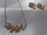Conjunto de corrente com pingente e brincos